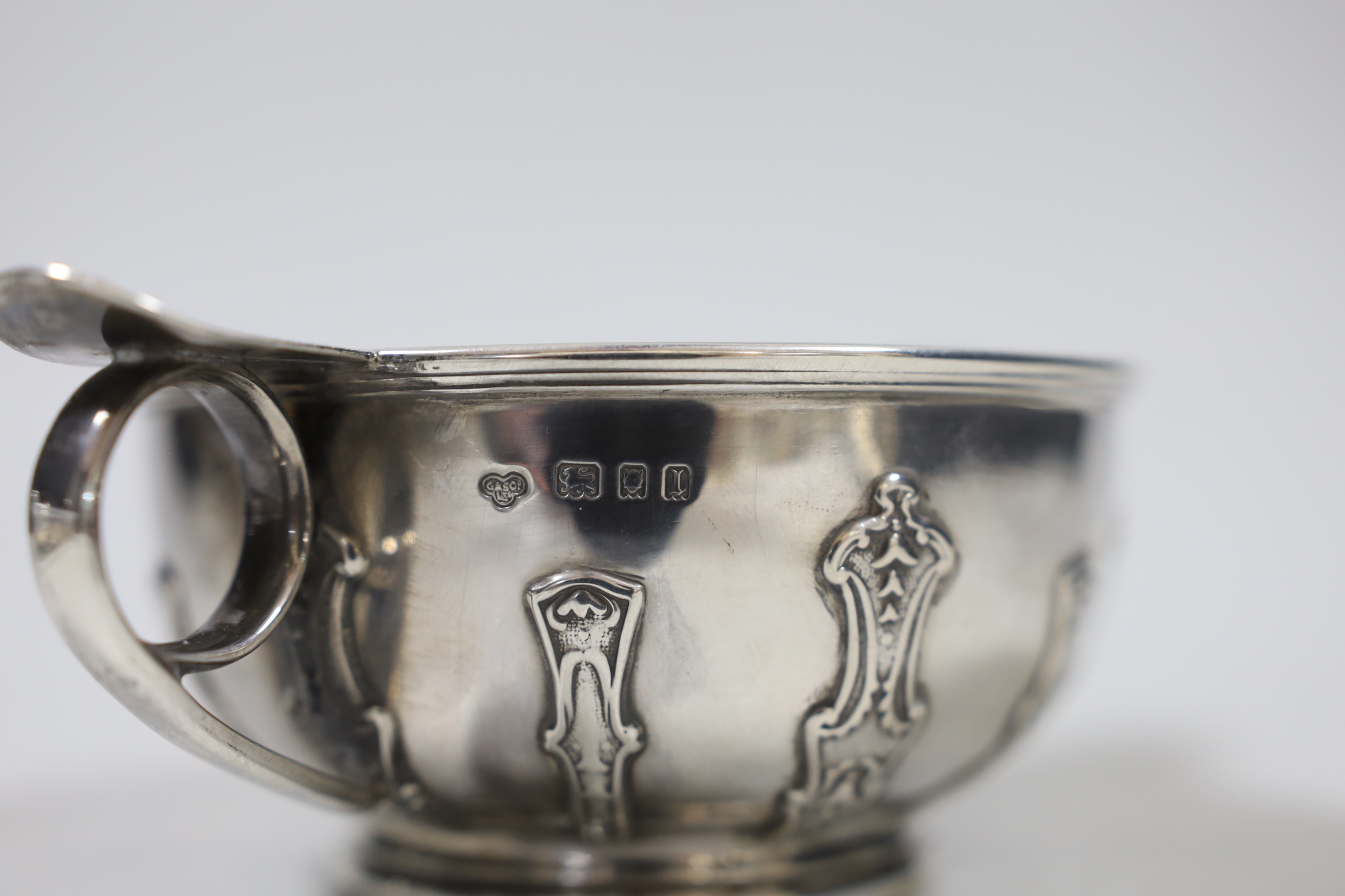 A George V silver two handled bowl, with cut card decoration, Goldsmiths & Silversmiths Co Ltd London, 1926. diameter 16.3cm over handles, 8.4oz.